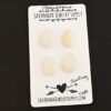 Surfing Moonstone Cabochon Parcel shown on business card