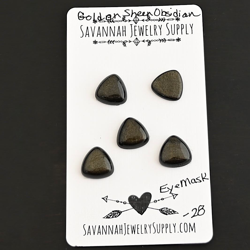 Eye Mask Golden Sheen Obsidian Cabochon Parcel shown on business card