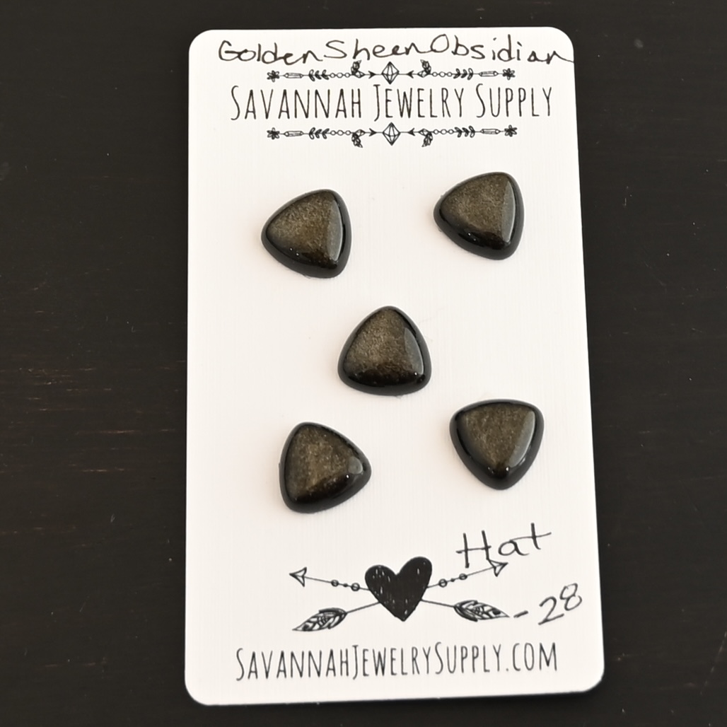 Hat Golden Sheen Obsidian Cabochon Parcel shown on business card