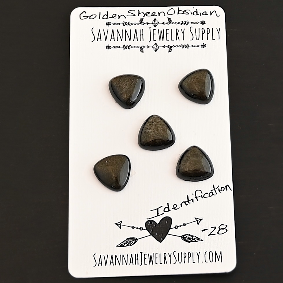 Identification Golden Sheen Obsidian Cabochon Parcel shown on business card