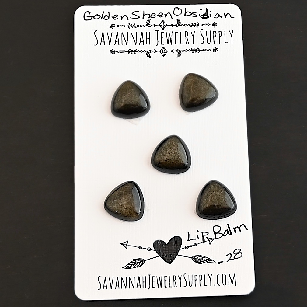 Lip Balm Golden Sheen Obsidian Cabochon Parcel shown on business card