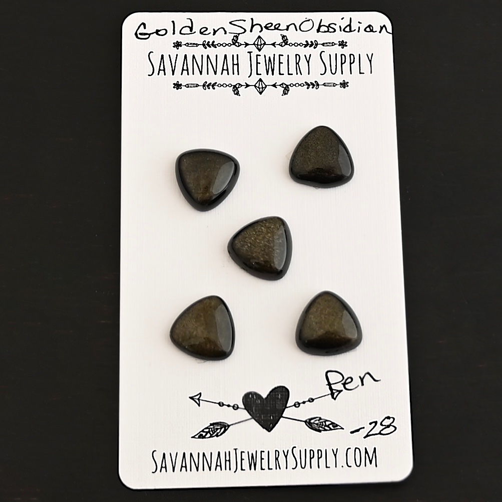 Pen Golden Sheen Obsidian Cabochon Parcel shown on business card