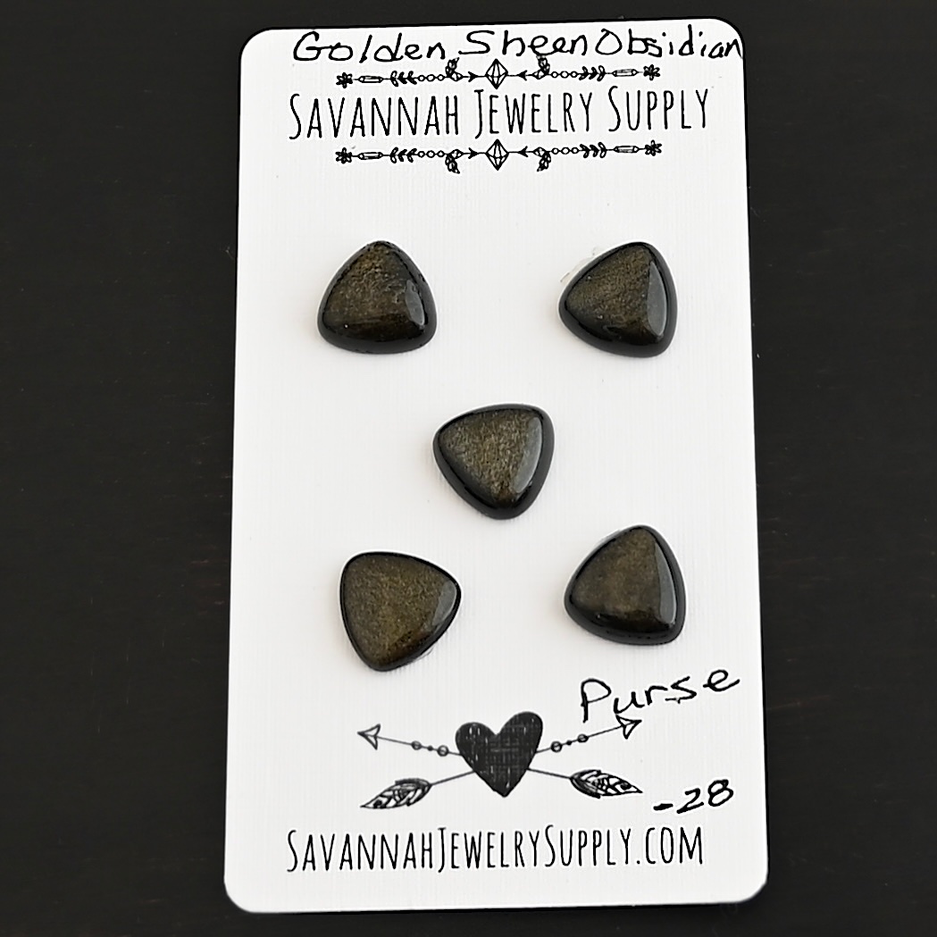 Purse Golden Sheen Obsidian Cabochon Parcel shown on business card