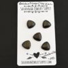 Umbrella Golden Sheen Obsidian Cabochon Parcel shown on business card
