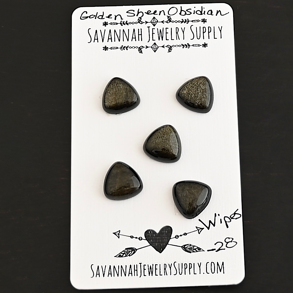Wipes Golden Sheen Obsidian Cabochon Parcel shown on business card