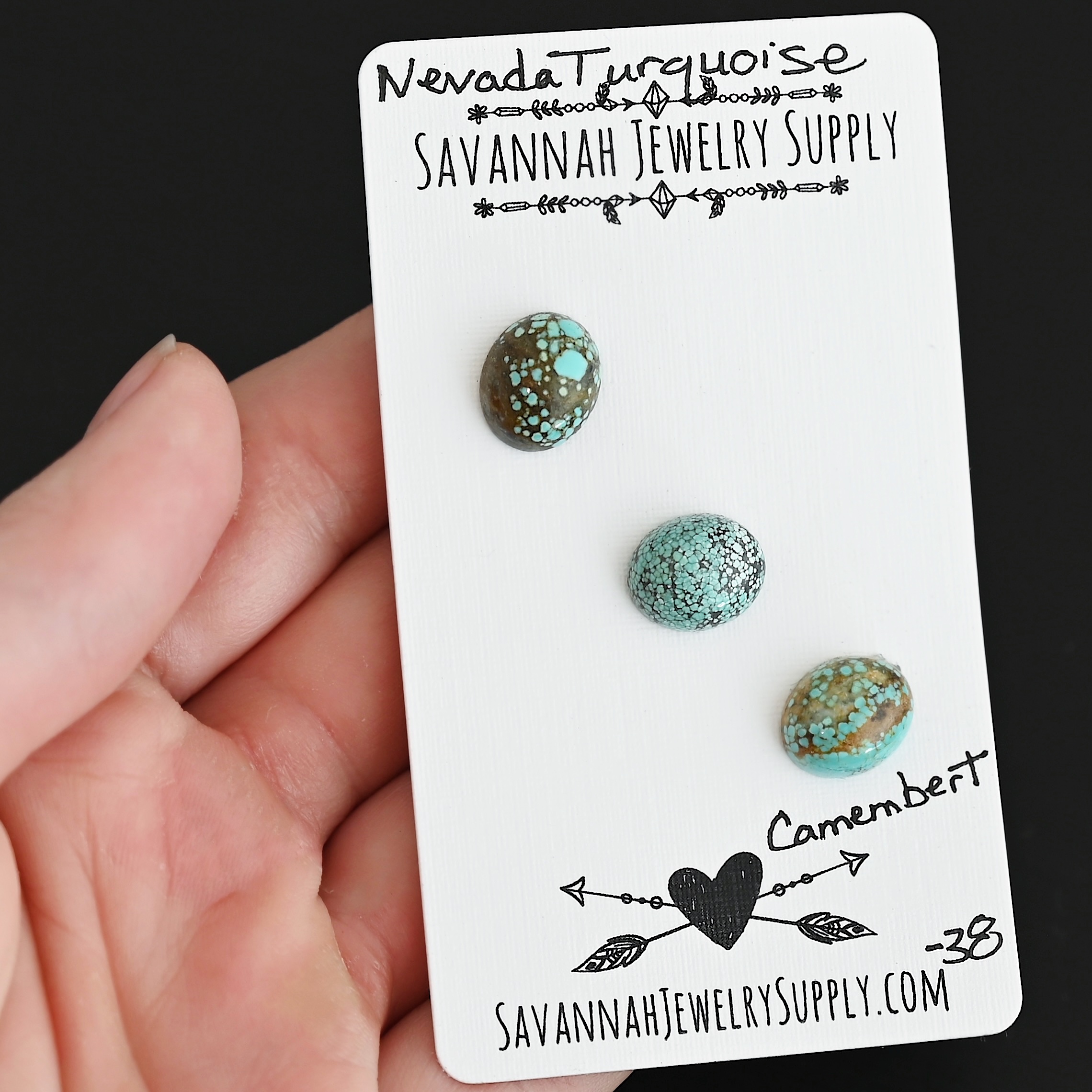Camembert Turquoise Cabochon Parcel shown in hand