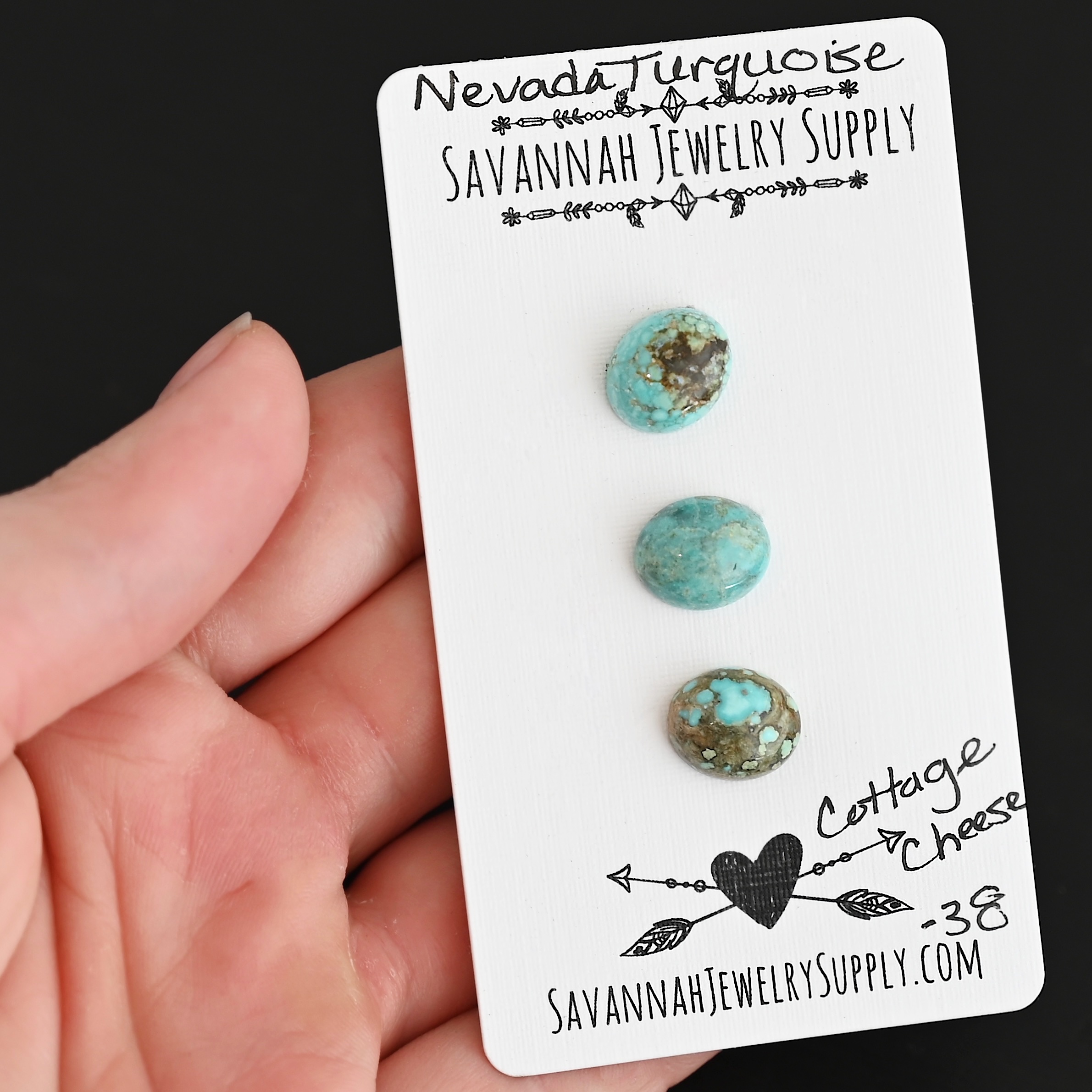 Cottage Cheese Turquoise Cabochon Parcel shown in hand