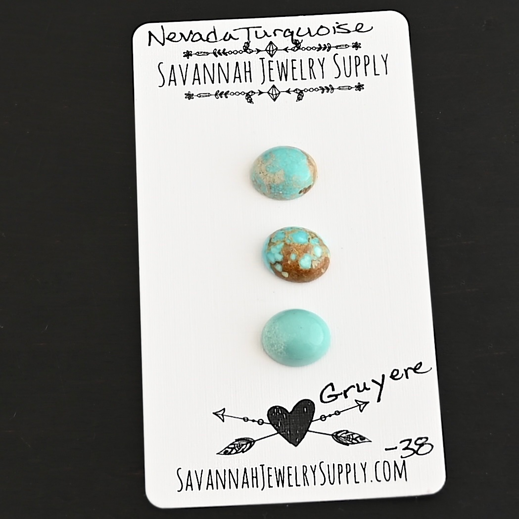 Gruyere Turquoise Cabochon Parcel shown on business card