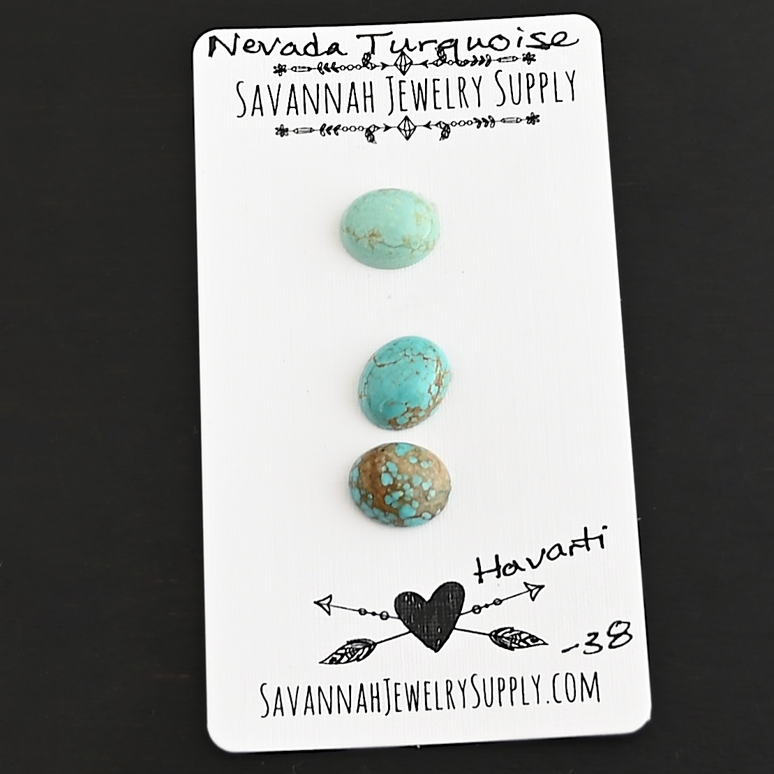 Harvarti Turquoise Cabochon Parcel shown on business card