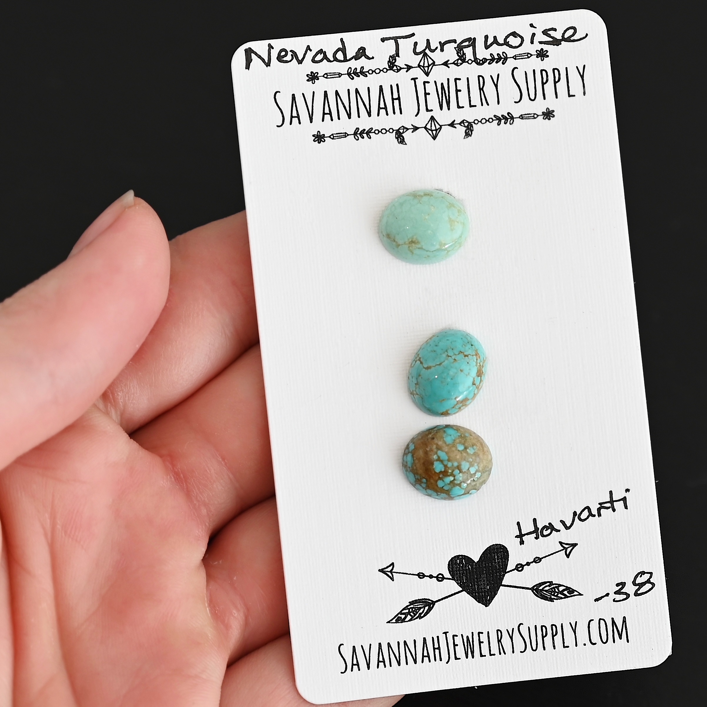 Harvarti Turquoise Cabochon Parcel shown in hand
