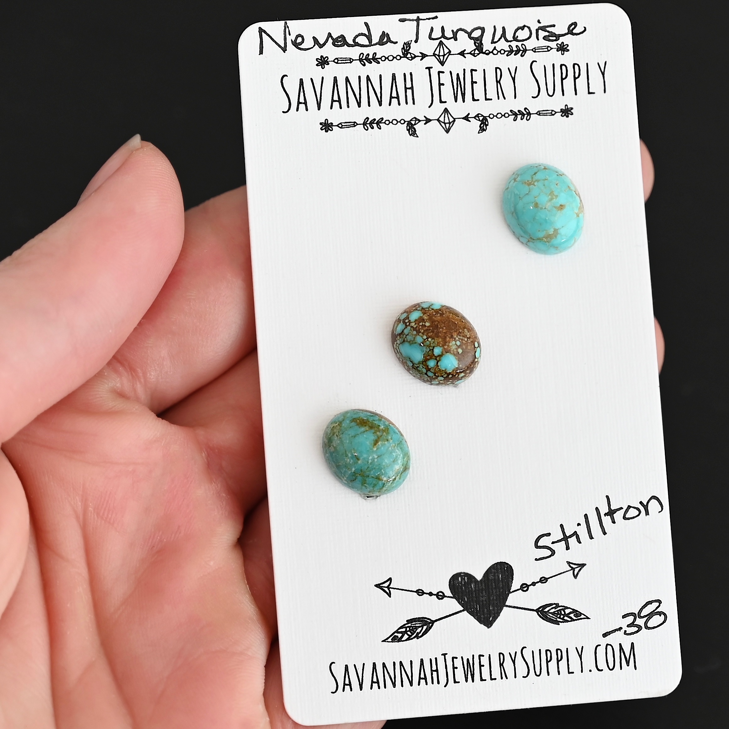 Stilton Turquoise Cabochon Parcel shown in hand