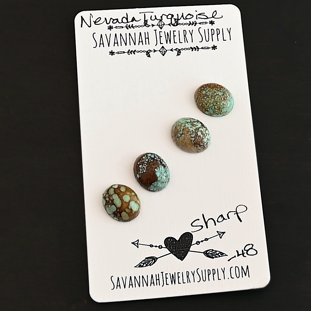 Sharp Turquoise Cabochon Parcel shown on business card