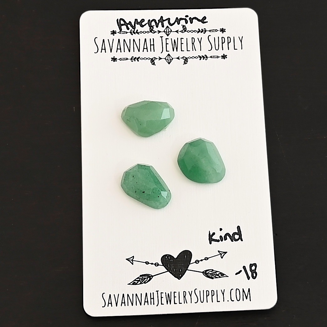 Kind Rose Cut Aventurine Cabochon Parcel shown on business card