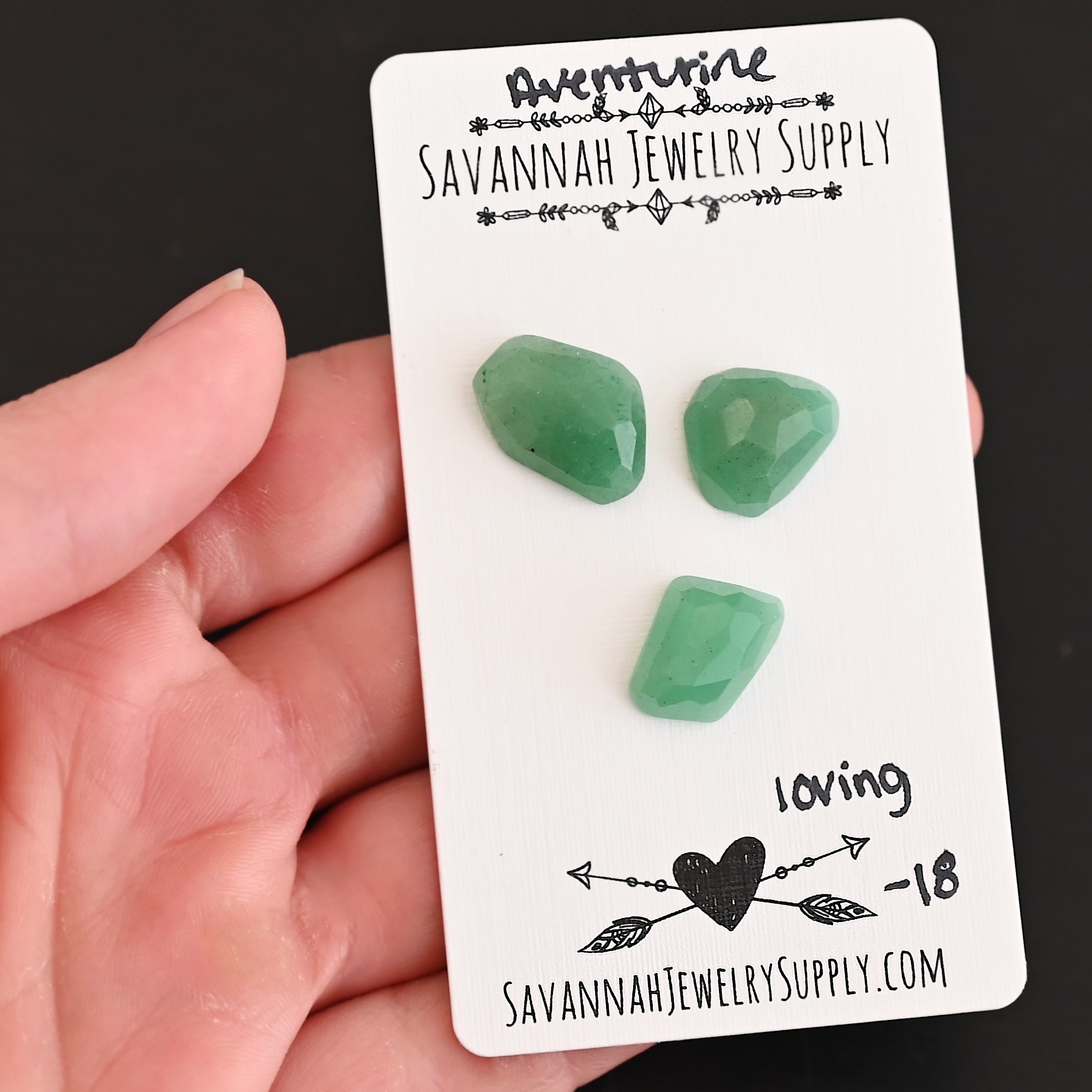 Loving Rose Cut Aventurine Cabochon Parcel shown in hand