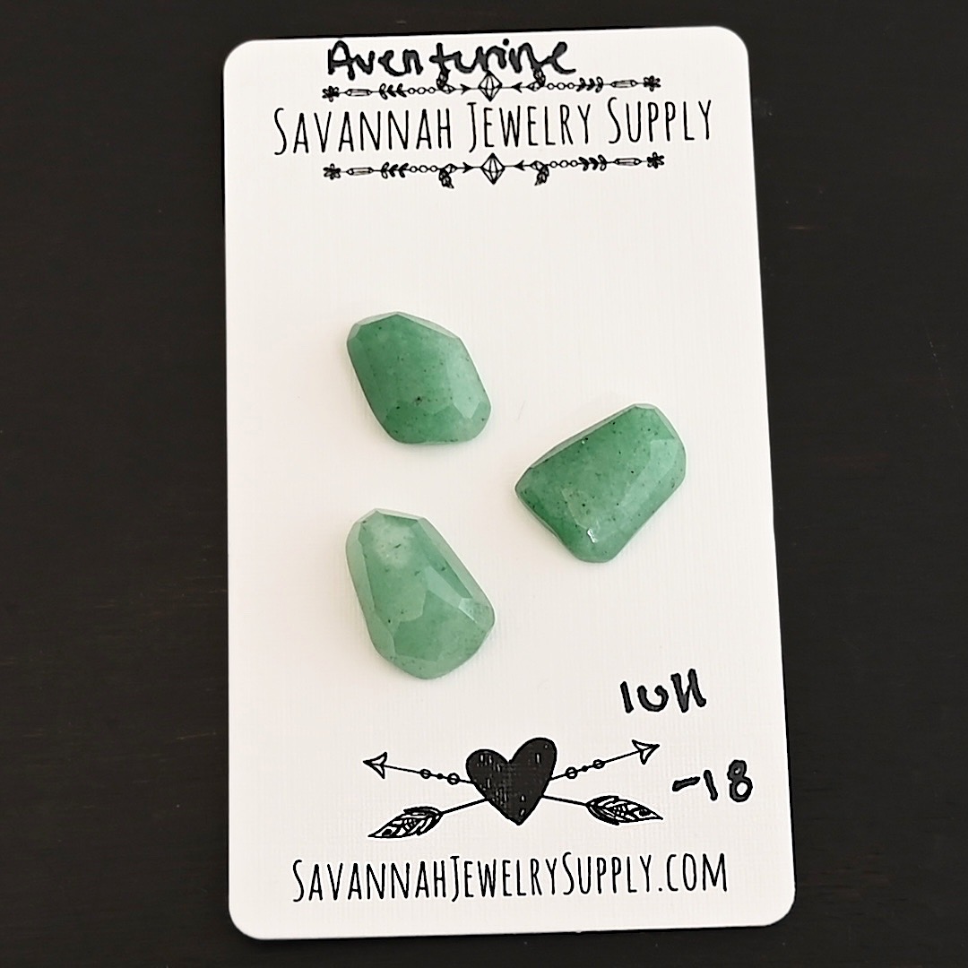 Lull Rose Cut Aventurine Cabochon Parcel shown on business card