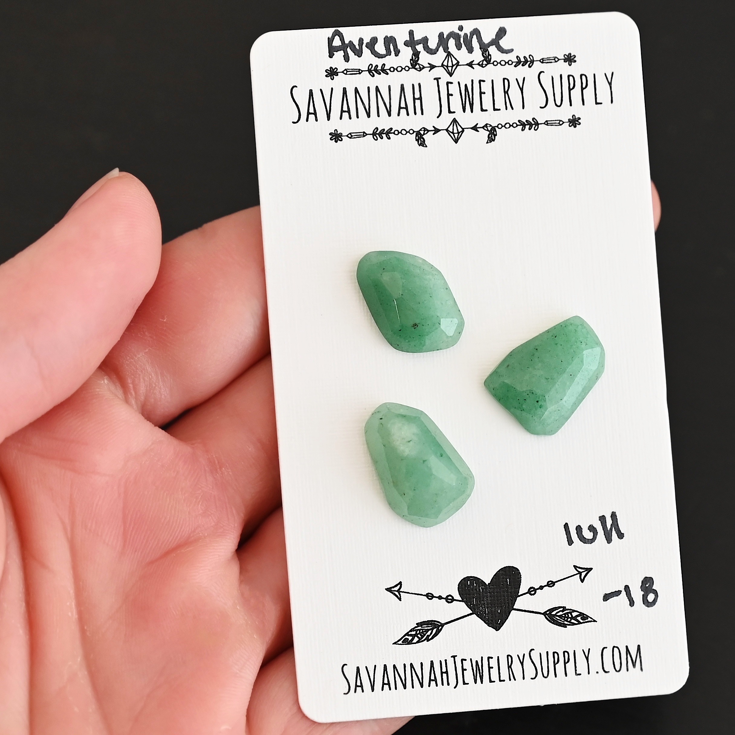 Lull Rose Cut Aventurine Cabochon Parcel shown in hand