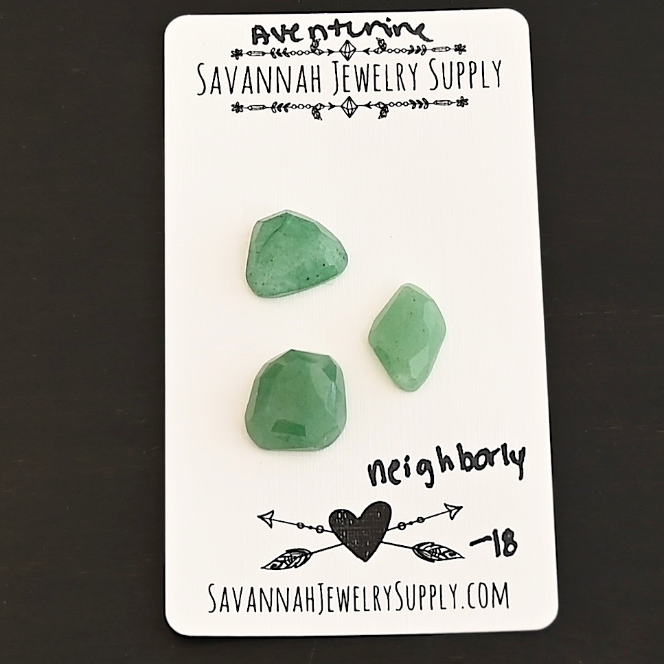 Neighborly Rose Cut Aventurine Cabochon Parcel shown on business card