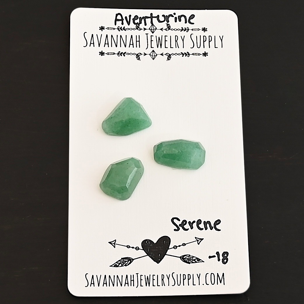 Serene Rose Cut Aventurine Cabochon Parcel shown on business card