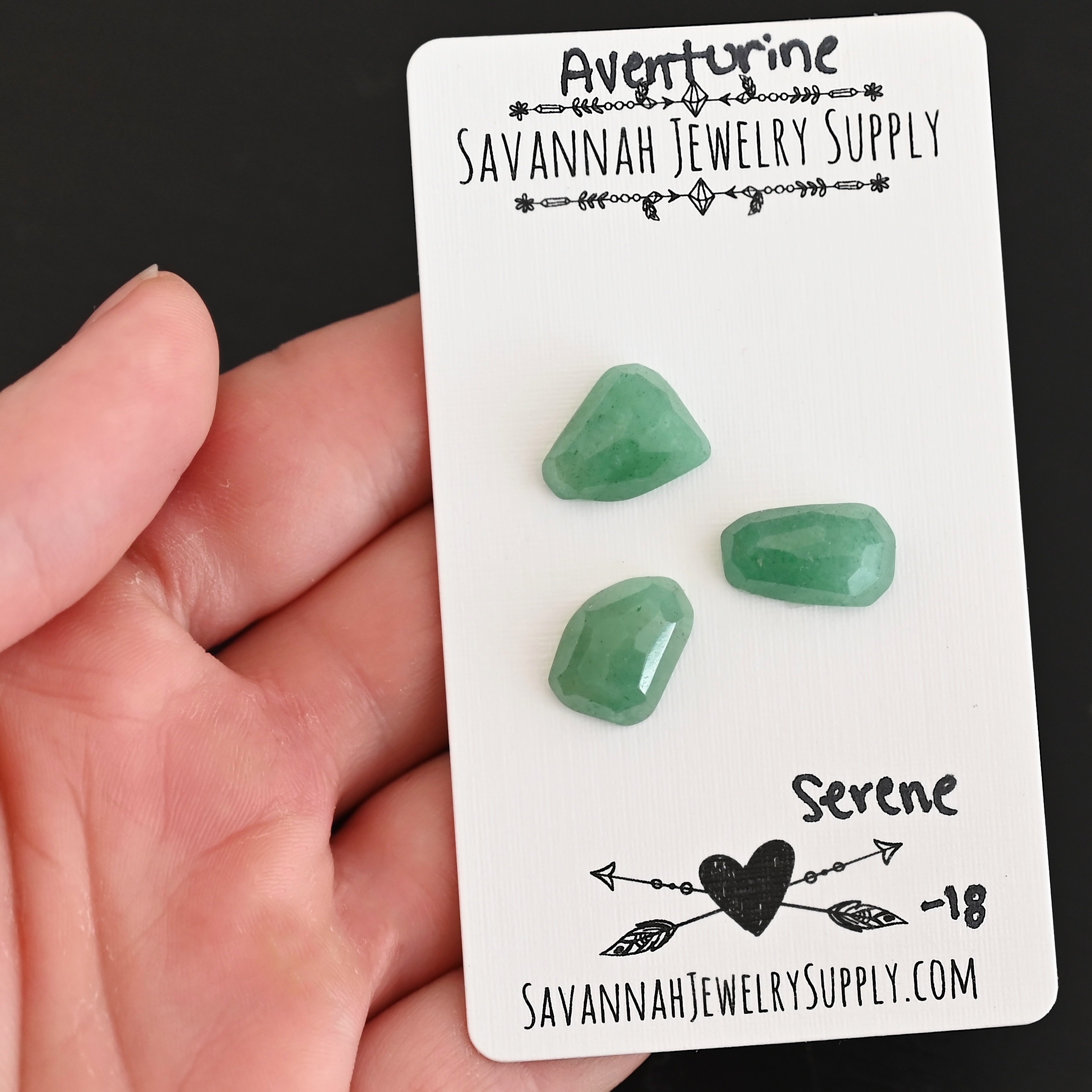 Serene Rose Cut Aventurine Cabochon Parcel shown in hand