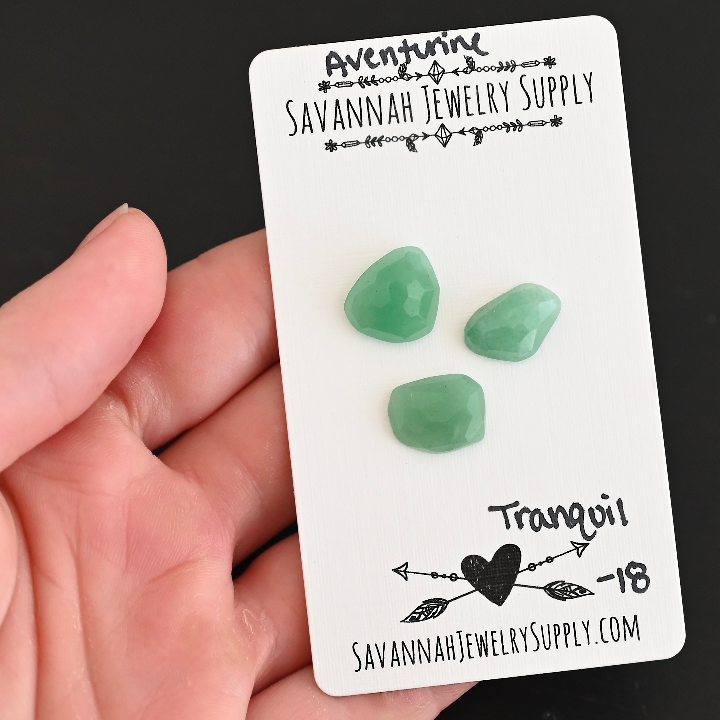 Tranquil Rose Cut Aventurine Cabochon Parcel shown in hand