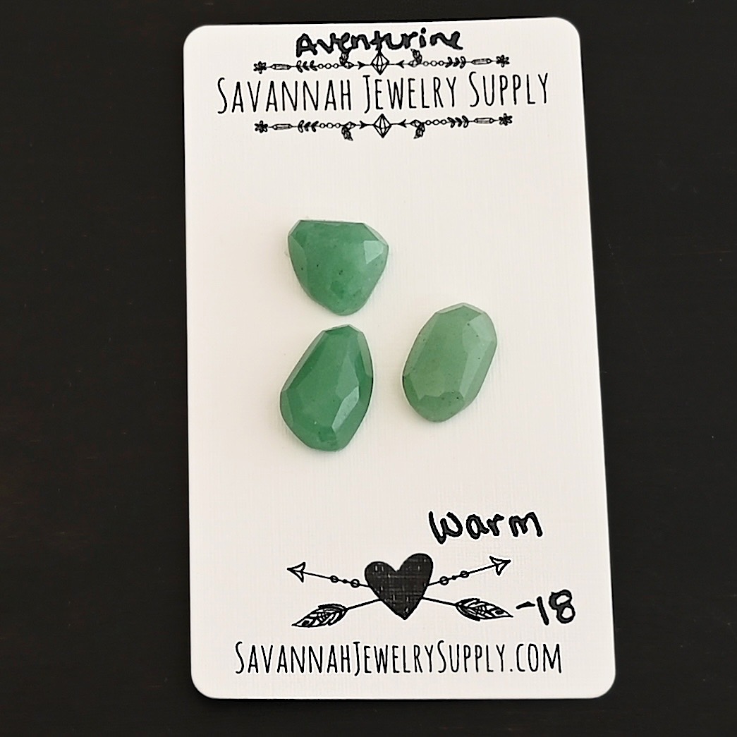 Warm Rose Cut Aventurine Cabochon Parcel shown on business card