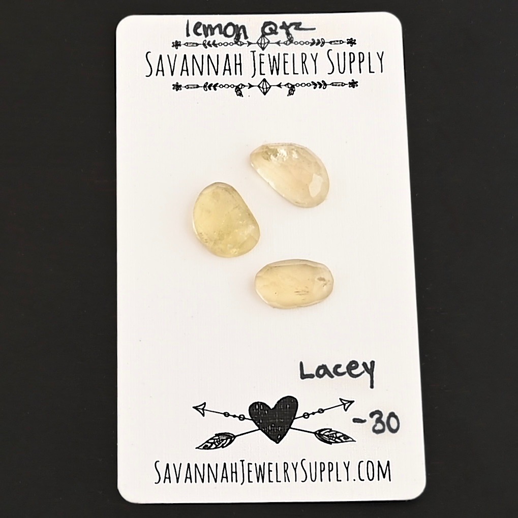 Lacey Rose Cut Lemon Quartz Cabochon Parcel shown on business card