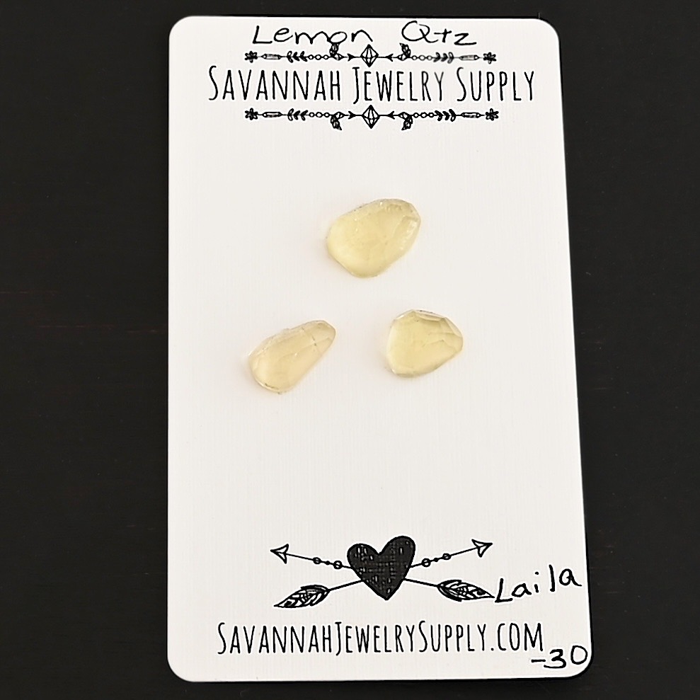 Laila Rose Cut Lemon Quartz Cabochon Parcel shown on business card