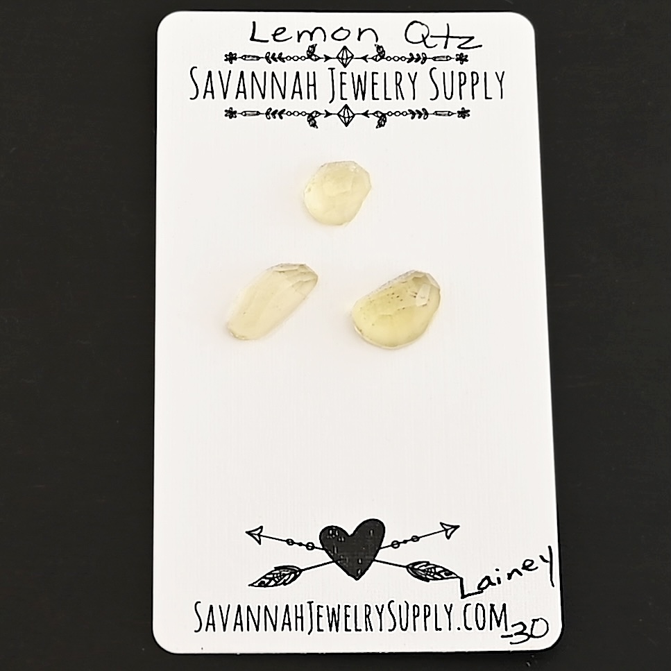 Lainey Rose Cut Lemon Quartz Cabochon Parcel shown on business card