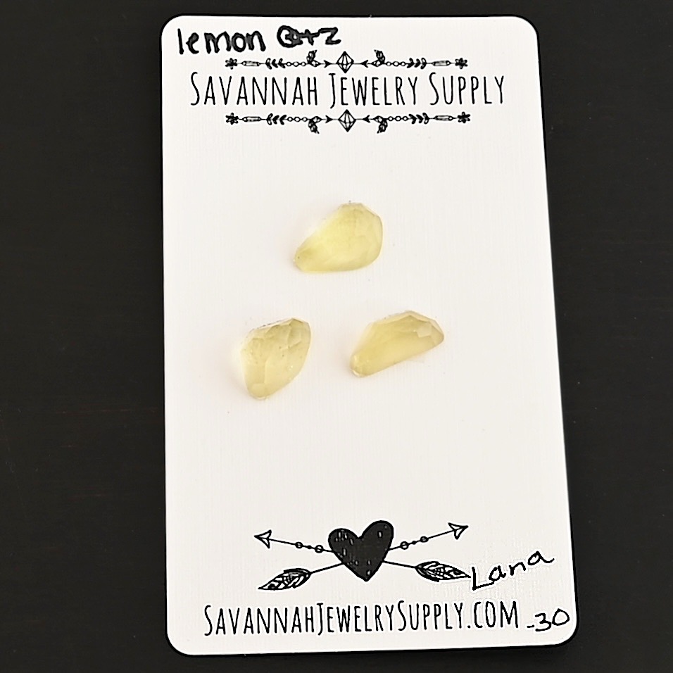 Lana Rose Cut Lemon Quartz Cabochon Parcel shown on business card