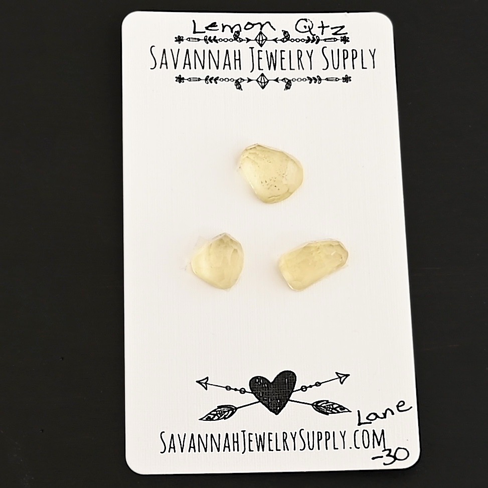 Lane Rose Cut Lemon Quartz Cabochon Parcel shown on business card