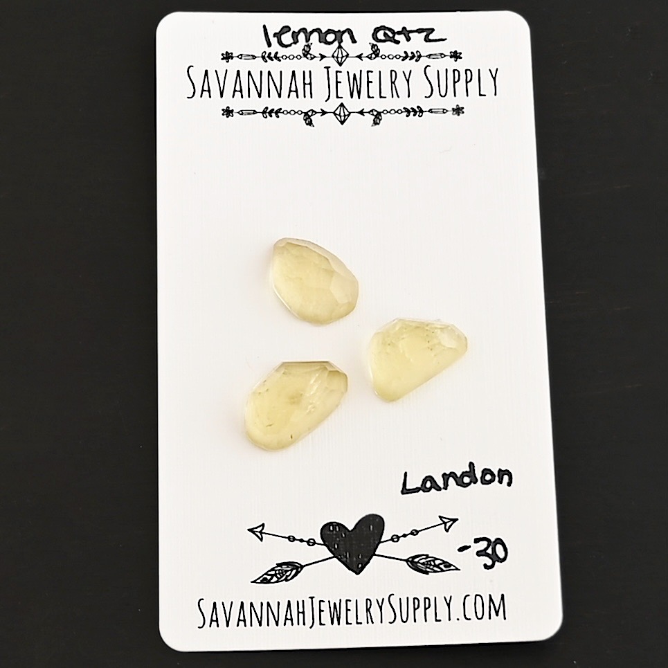 Landon Rose Cut Lemon Quartz Cabochon Parcel shown on business card