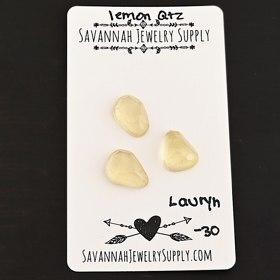 Lauryn Rose Cut Lemon Quartz Cabochon Parcel shown on business card
