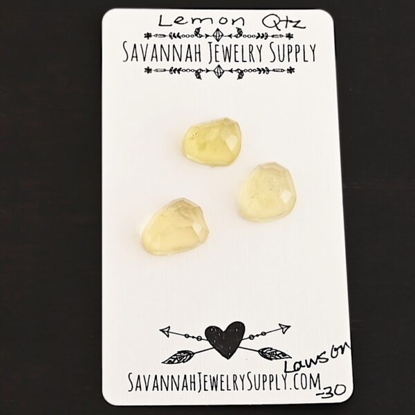 Lawson Rose Cut Lemon Quartz Cabochon Parcel shown on business card