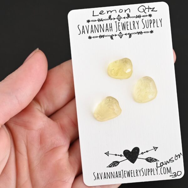 Lawson Rose Cut Lemon Quartz Cabochon Parcel shown in hand