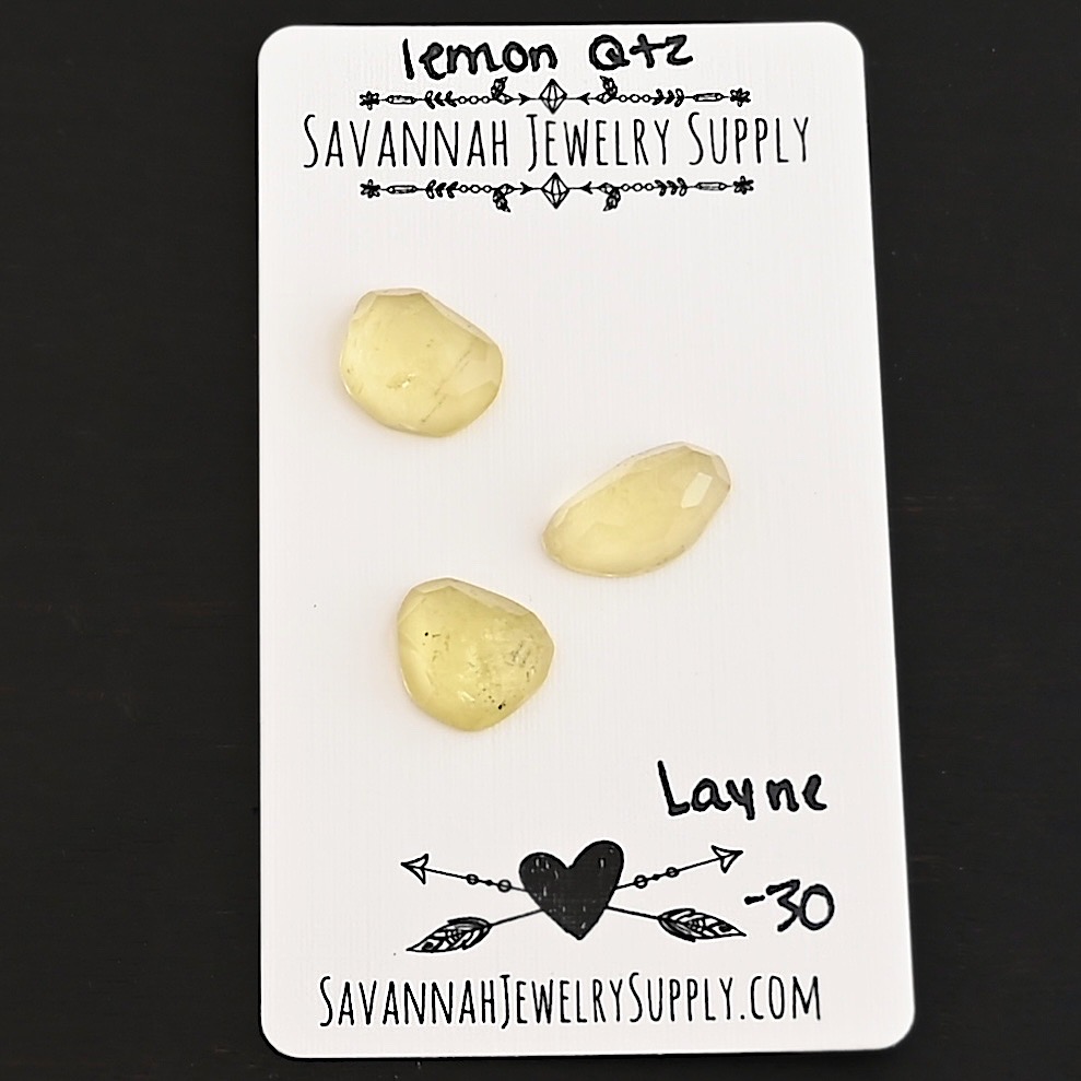 Layne Rose Cut Lemon Quartz Cabochon Parcel shown on business card