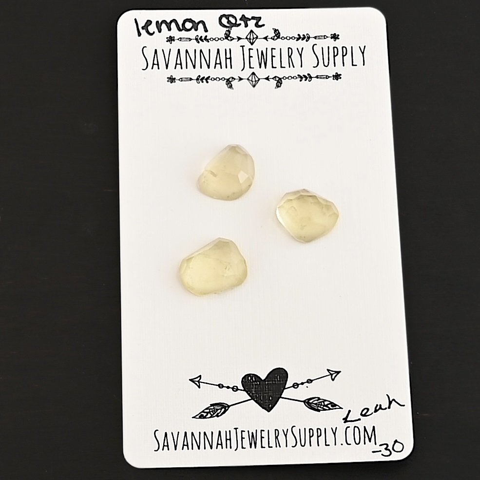 Leah Rose Cut Lemon Quartz Cabochon Parcel shown on business card