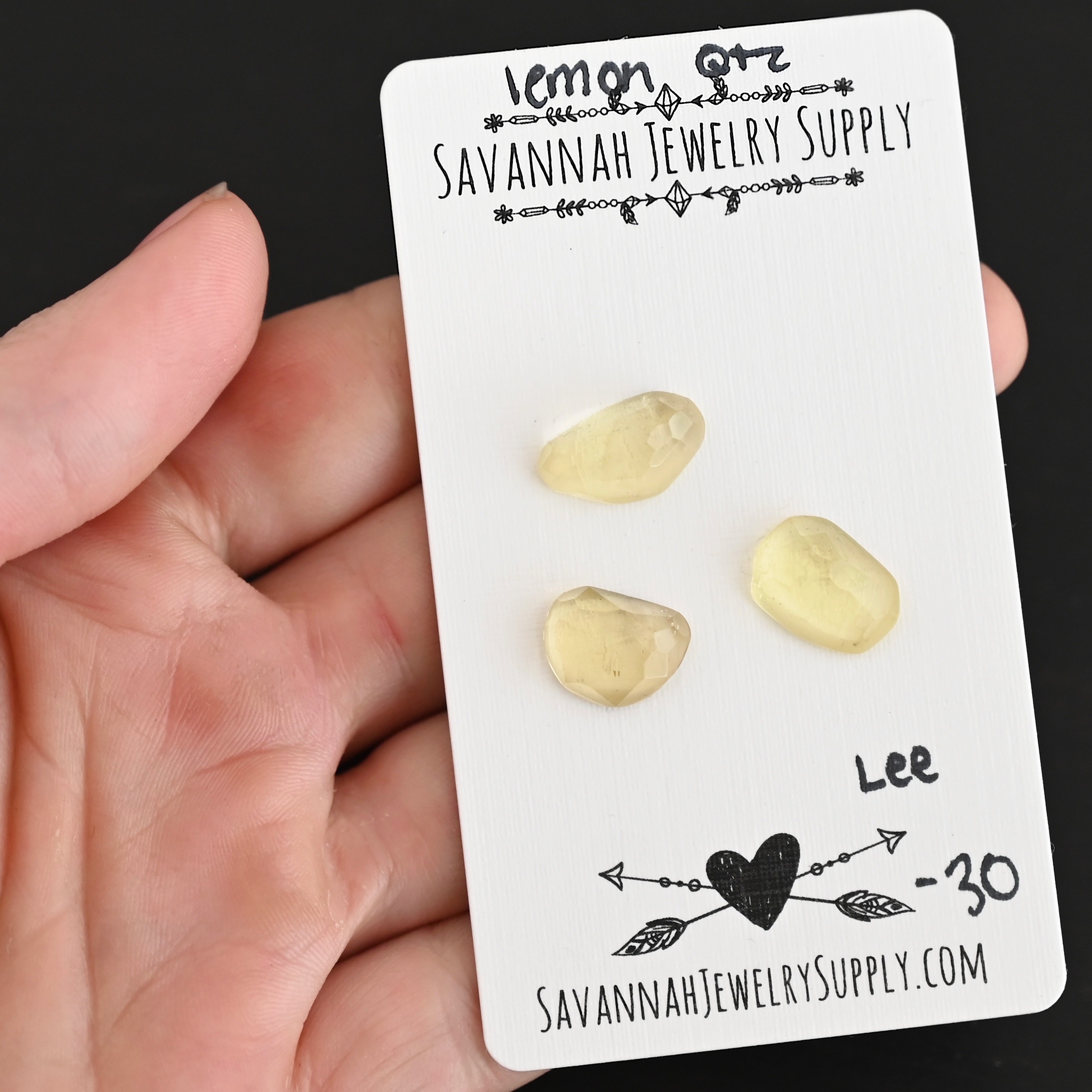 Lee Rose Cut Lemon Quartz Cabochon Parcel shown in hand