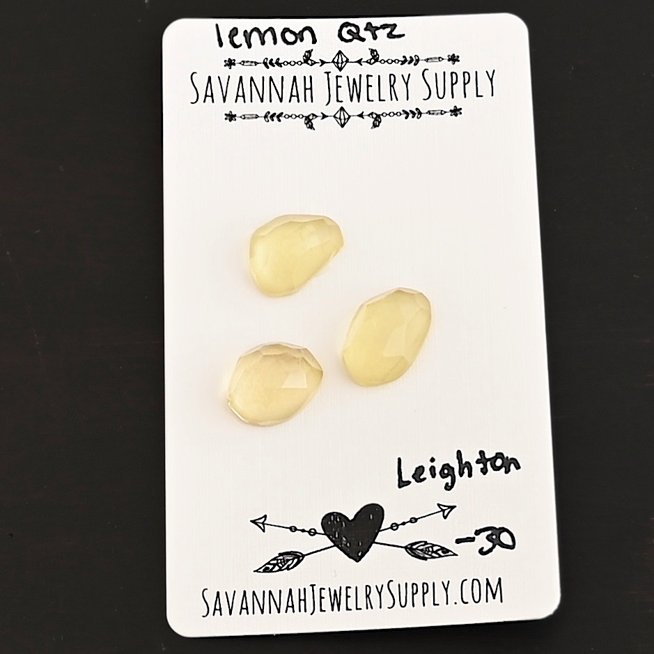 Leighton Rose Cut Lemon Quartz Cabochon Parcel shown on business card