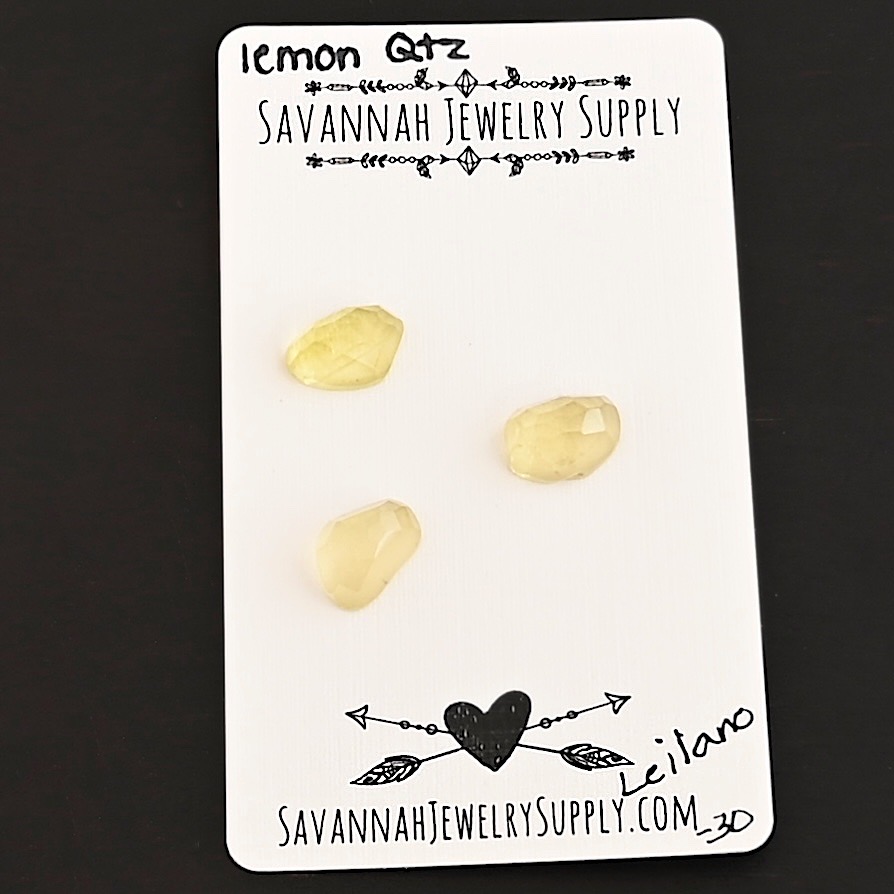 Leilano Rose Cut Lemon Quartz Cabochon Parcel shown on business card