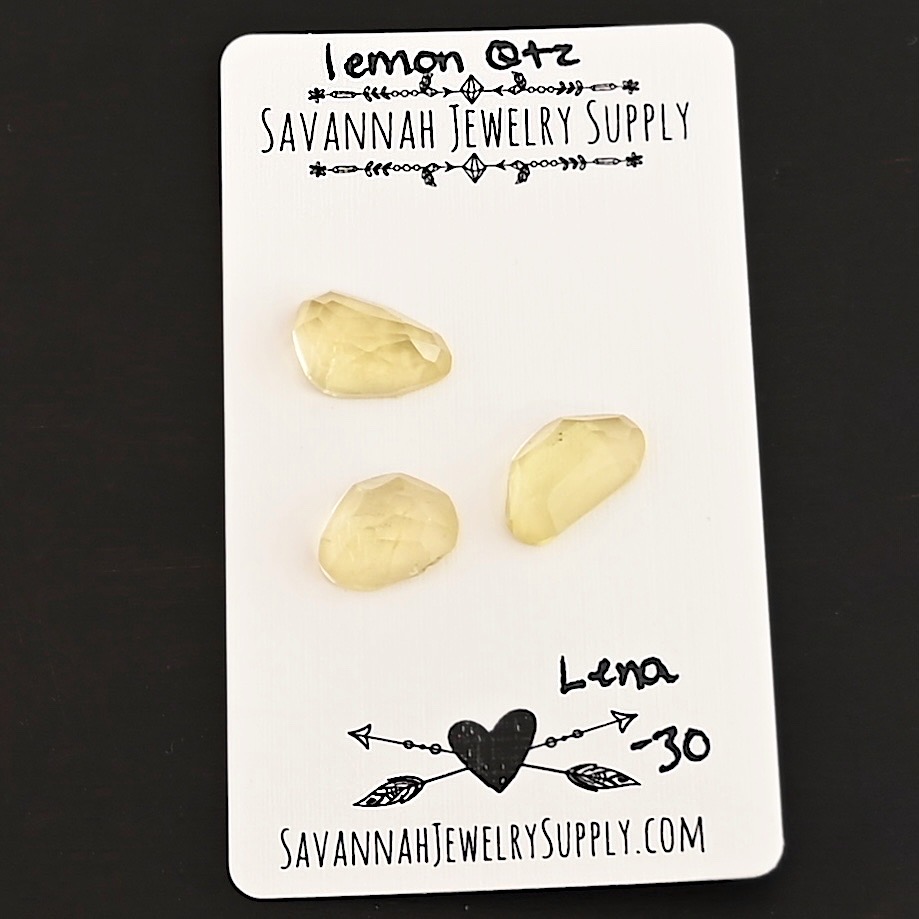 Lena Rose Cut Lemon Quartz Cabochon Parcel shown on business card