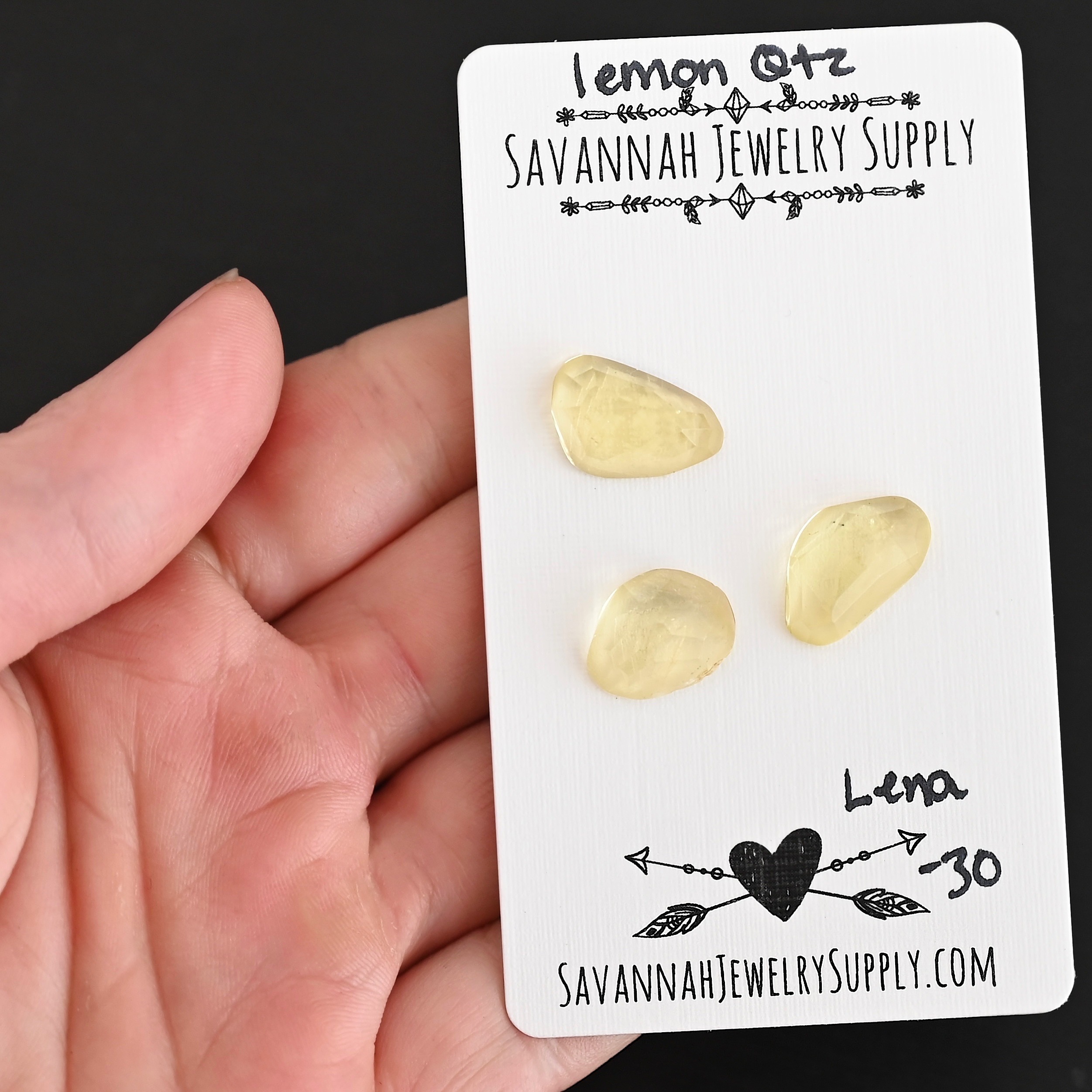 Lena Rose Cut Lemon Quartz Cabochon Parcel shown in hand