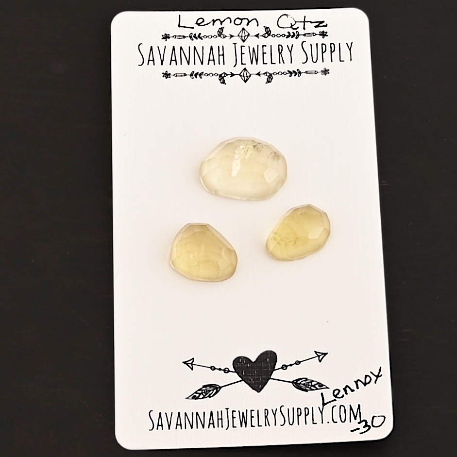 Lennox Rose Cut Lemon Quartz Cabochon Parcel shown on business card