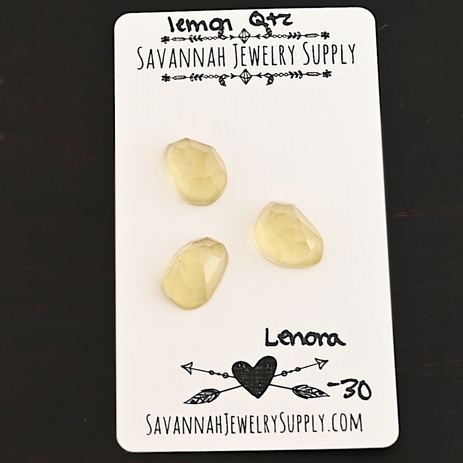 Lenora Rose Cut Lemon Quartz Cabochon Parcel shown on business card