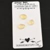 Leon Rose Cut Lemon Quartz Cabochon Parcel shown on business card