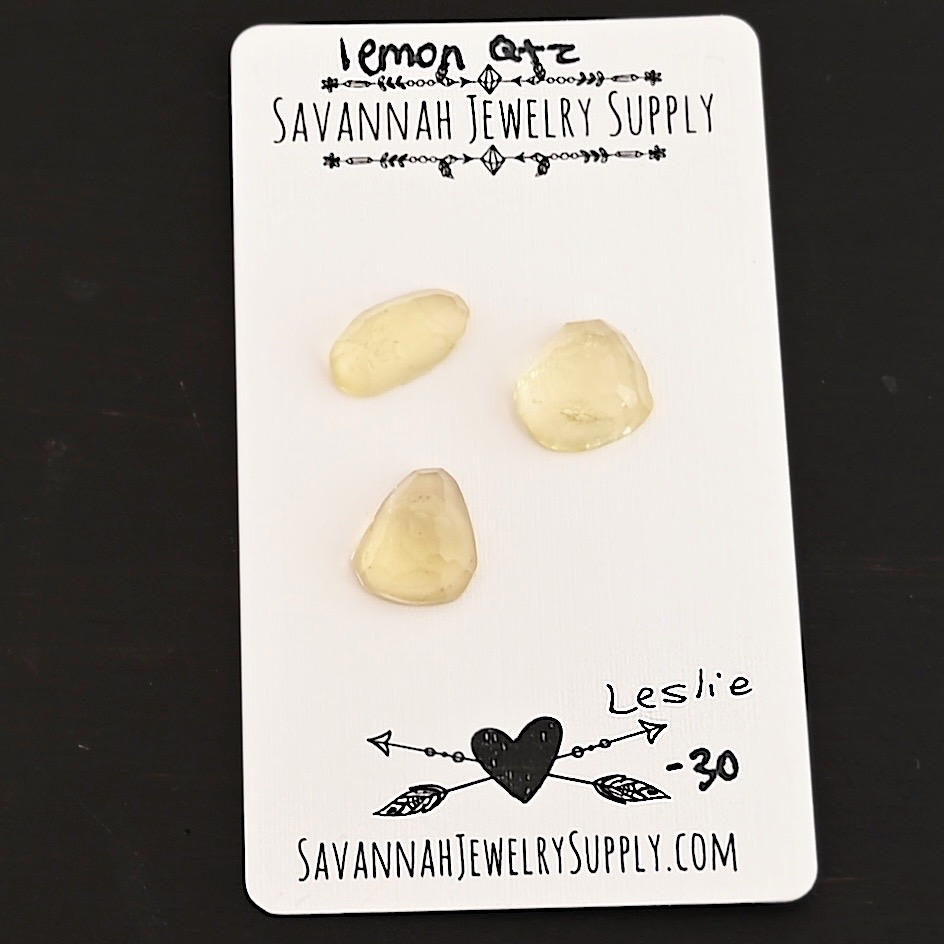 Leslie Rose Cut Lemon Quartz Cabochon Parcel shown on business card
