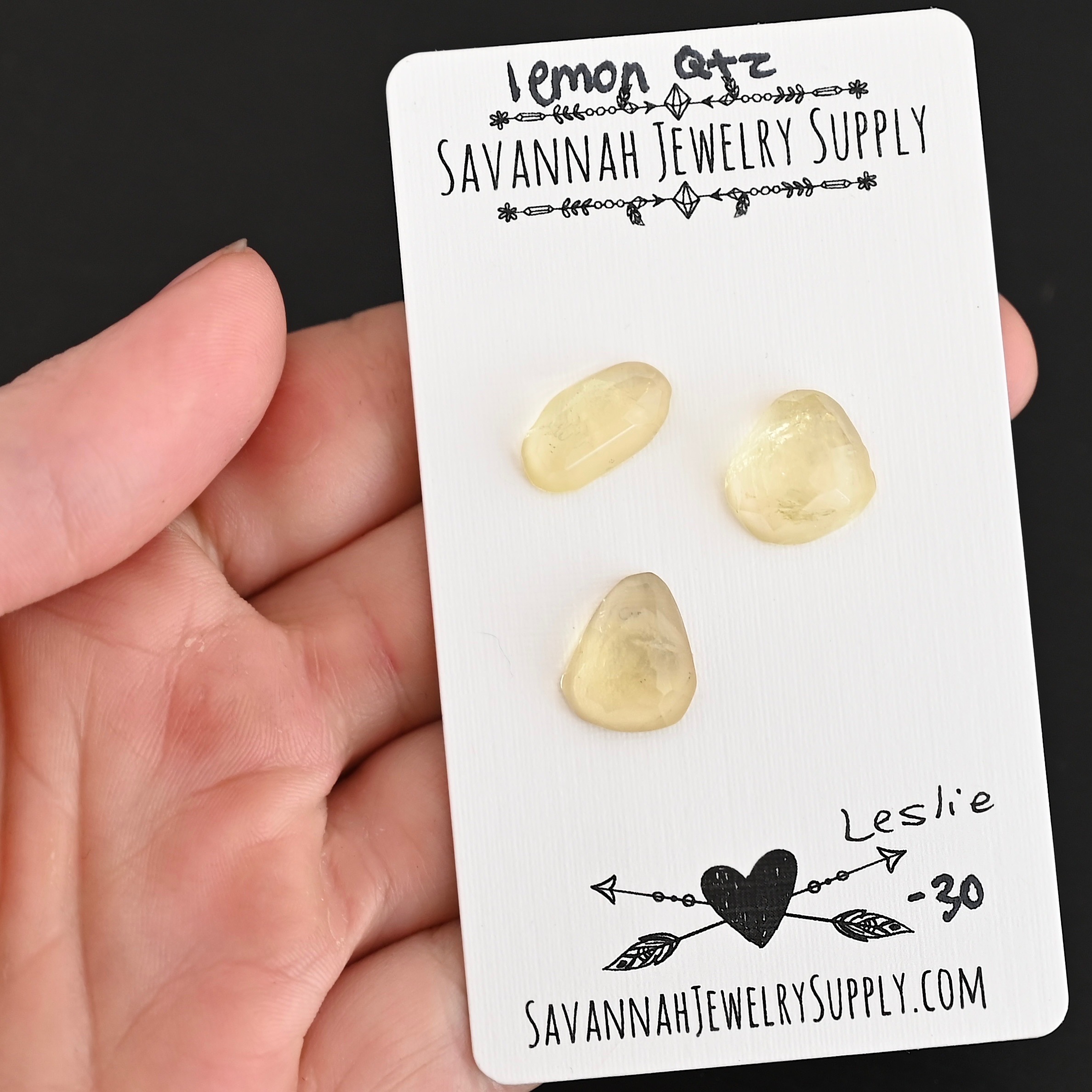 Leslie Rose Cut Lemon Quartz Cabochon Parcel shown in hand