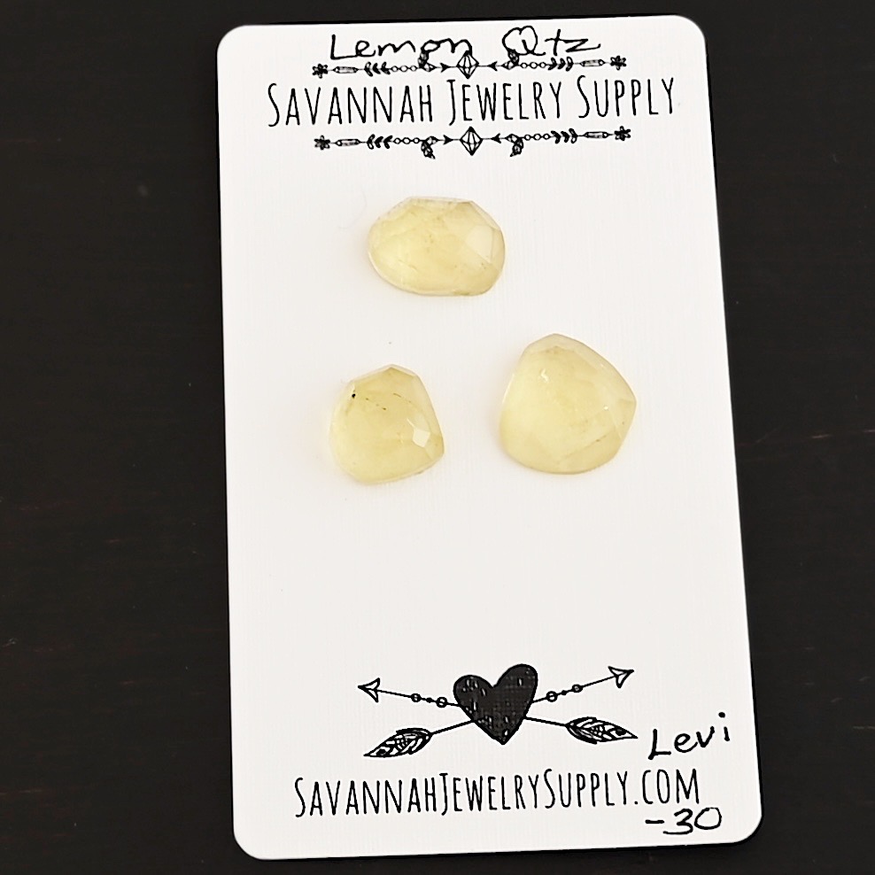 Levi Rose Cut Lemon Quartz Cabochon Parcel shown on business card