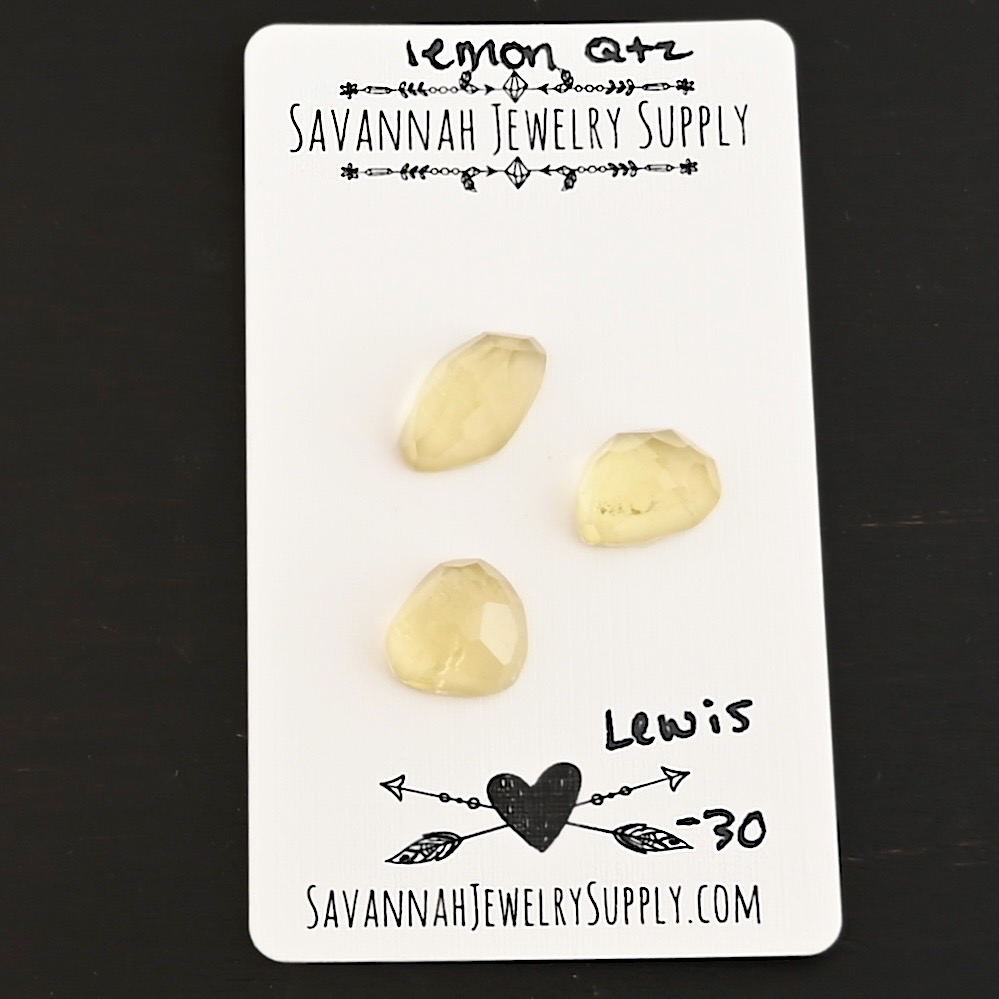 Lewis Rose Cut Lemon Quartz Cabochon Parcel shown on business card