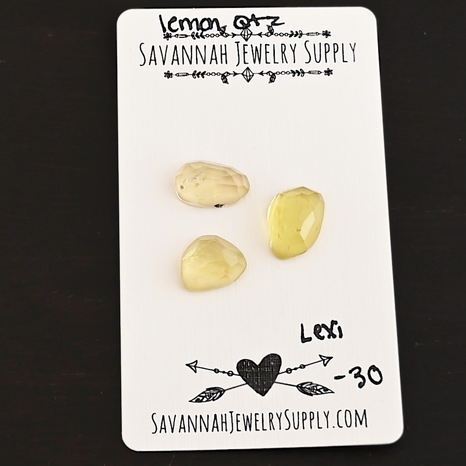 Lexi Rose Cut Lemon Quartz Cabochon Parcel shown on business card