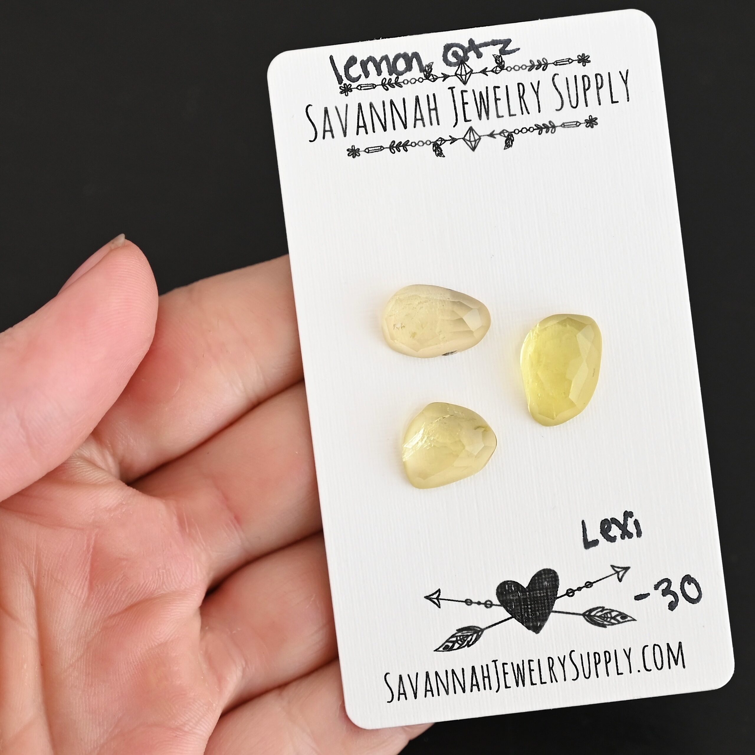 Lexi Rose Cut Lemon Quartz Cabochon Parcel shown in hand